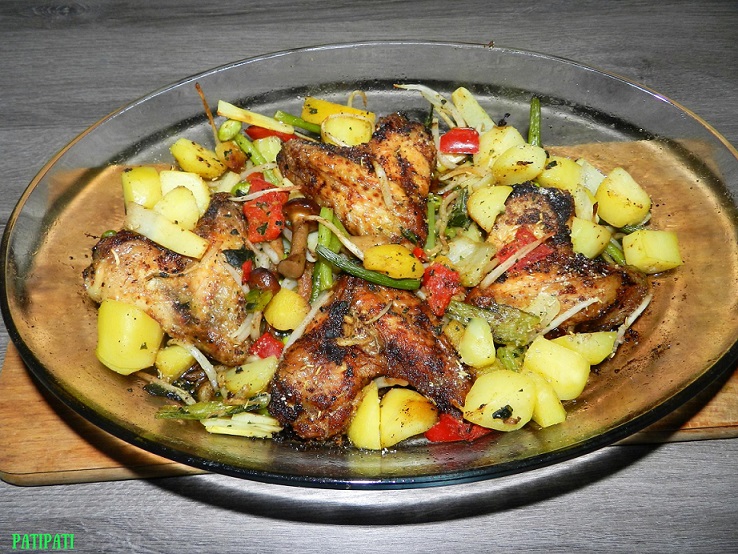 Ailes de poulet aux epices et legumes